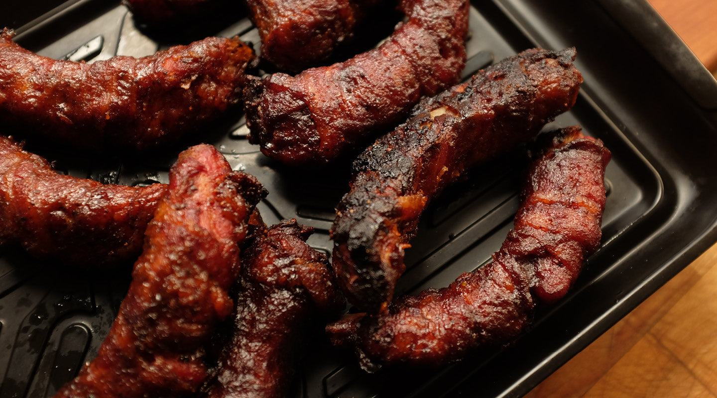Bacon Rigs Make These Bacon Wrapped Baby Back Ribs